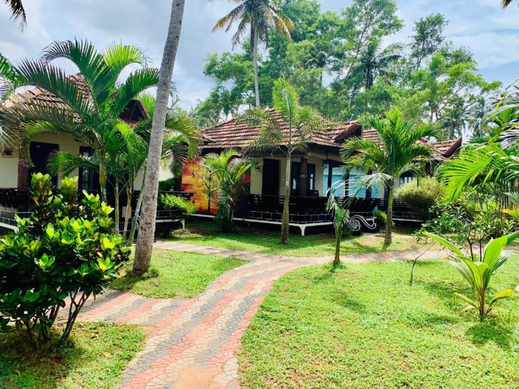 Maadathil & Hotel Varkala
